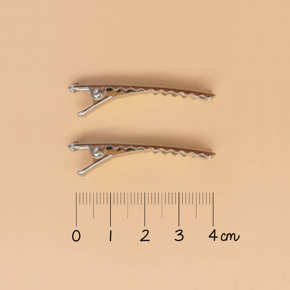 Luciole et Petit Pois - Barrettes mini coquillages dorés (paire)