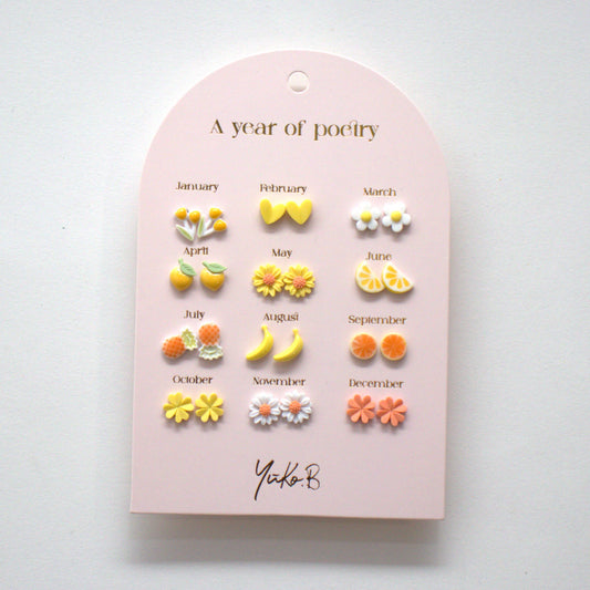 Kontiki - 12 Paires de Boucles d'oreilles "Un an de poésie" - Yuko B.: Orange & Jaune