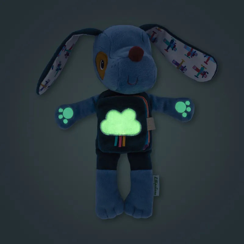 Peluche phosphorescente et livre en tissu