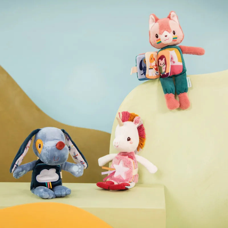 Peluche phosphorescente et livre en tissu