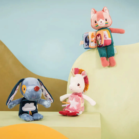 Peluche phosphorescente et livre en tissu